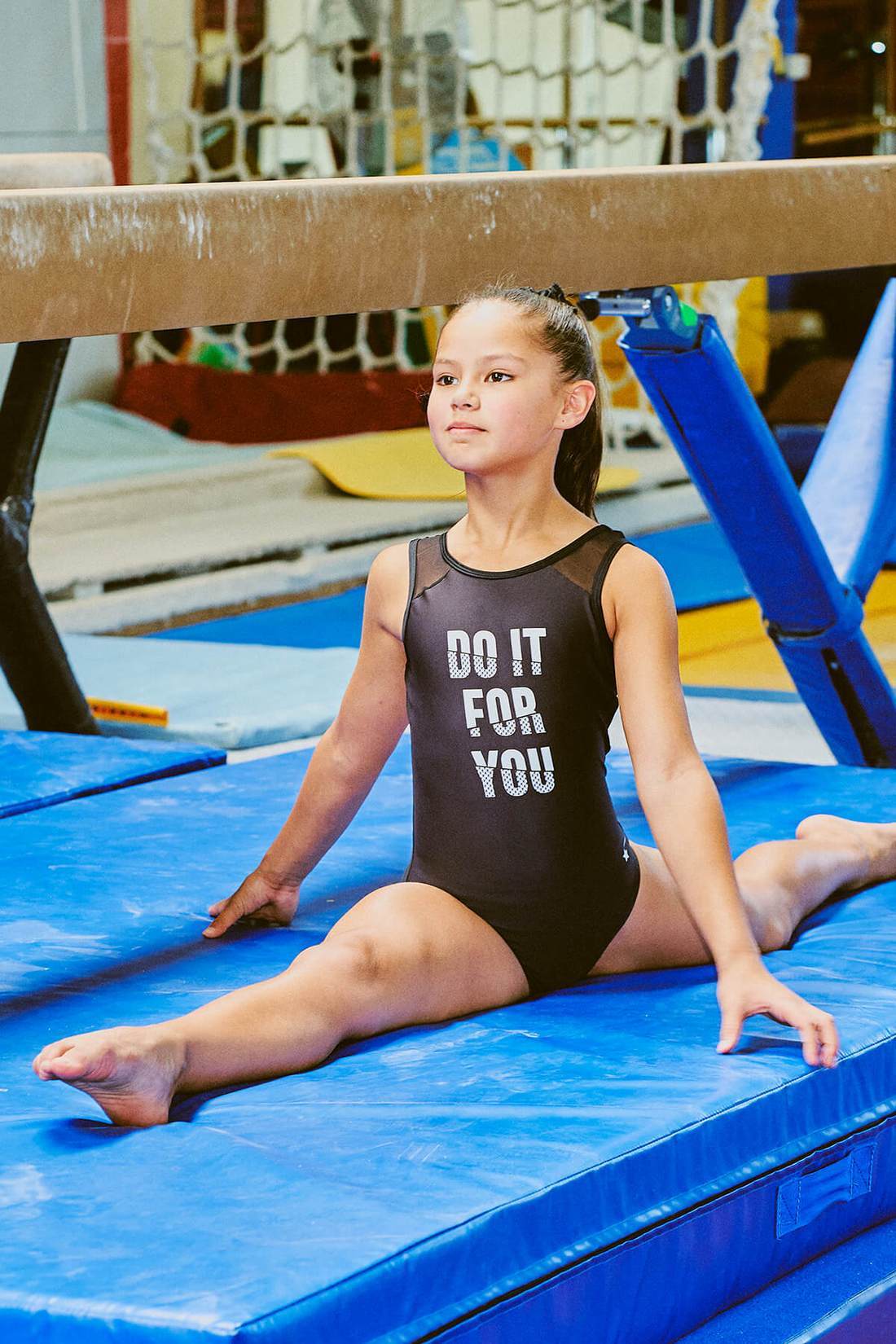 little girls in gymnastics leotards